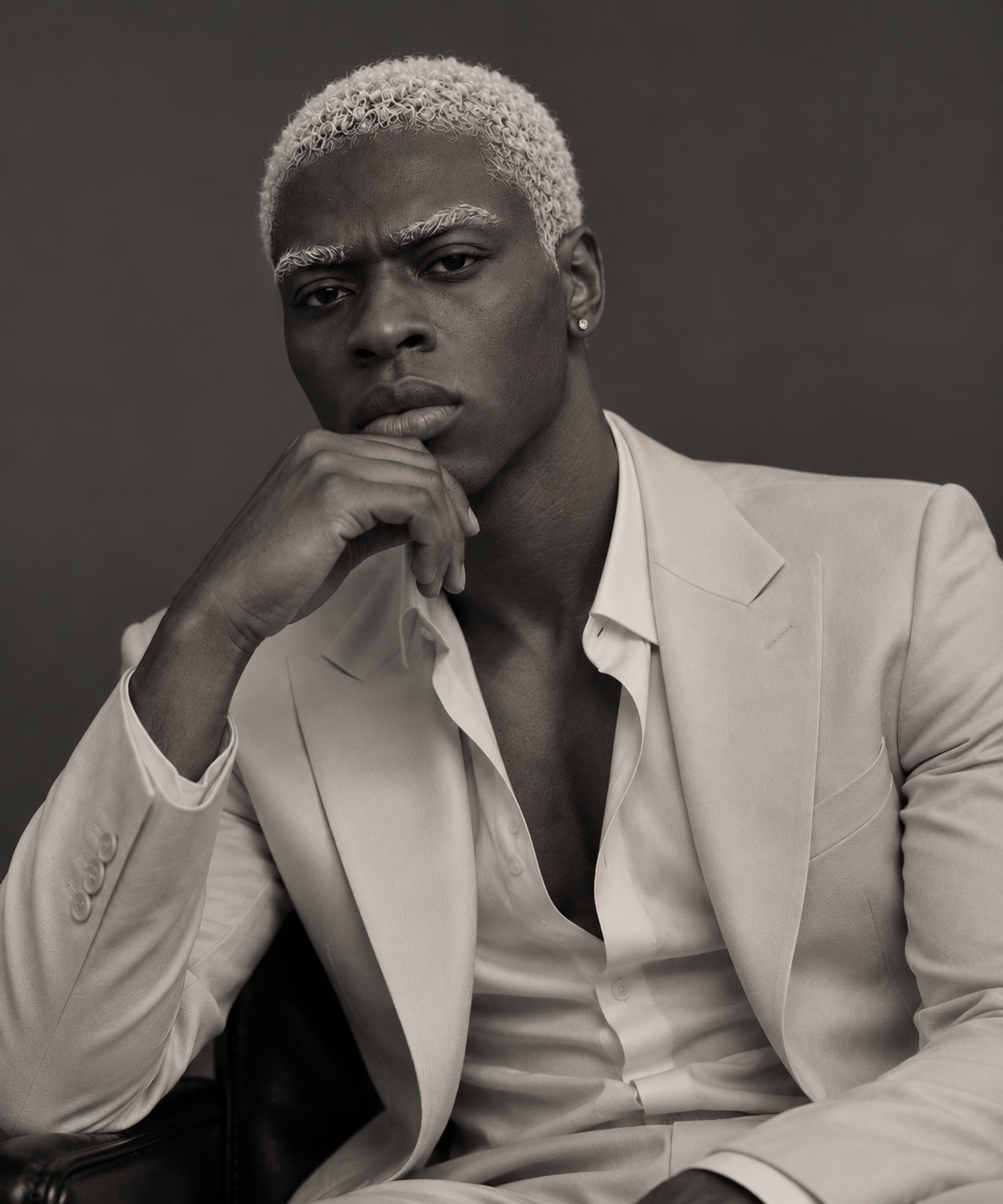 Black-and-white editorial portrait of Ebeguowen Otasowie